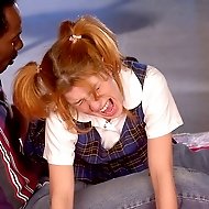 Cute school girl in pain from a hard bare assed spanking